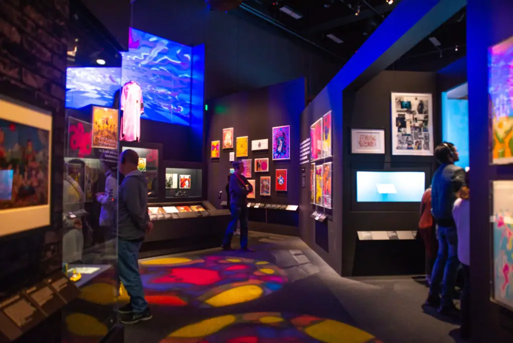 1960s museum exhibition daerk room with wall exhibits
