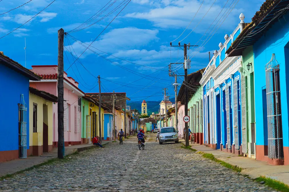 colourful houses and cobbled street in vinales cuba